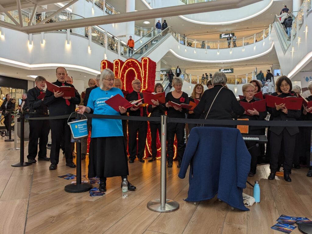 Kingston Choral Society singing to Bentall Centre shoppers. (Photo: Supplied)