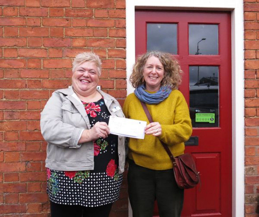 Bev and Claire outside the Oakham Community Fridge. Image credit: Root-and-Branch Out CIC.