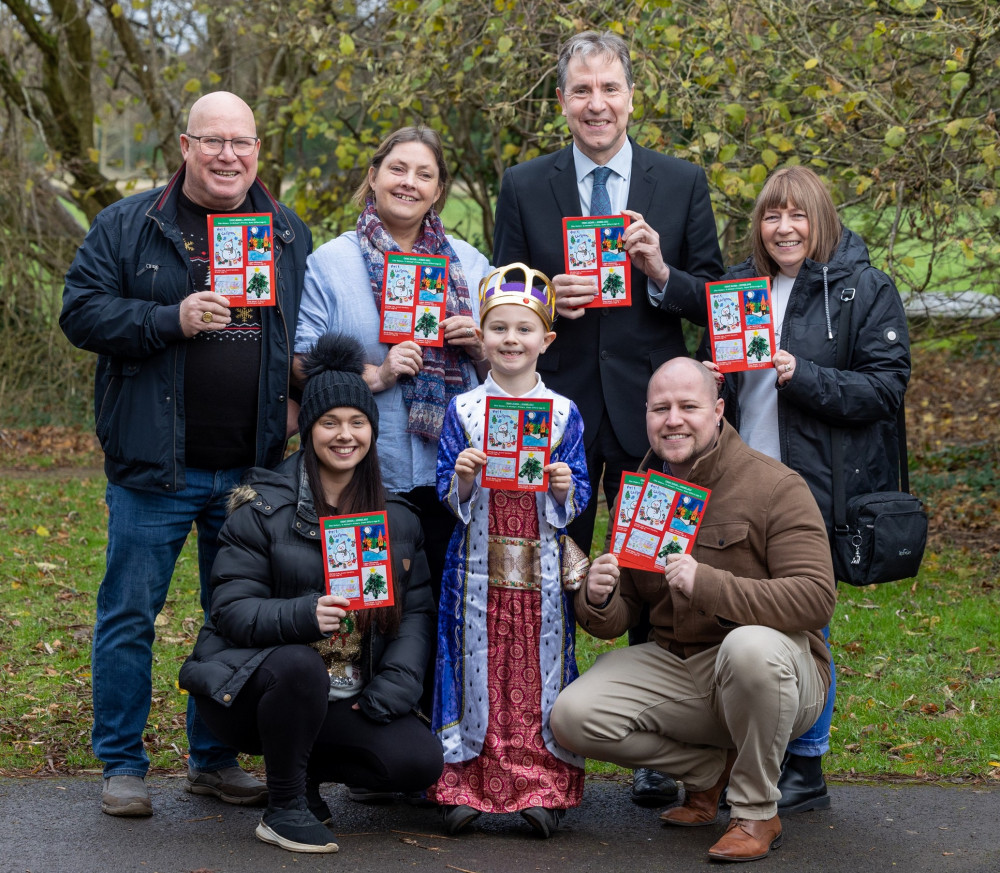 Mayor Norris, Theo plus his parents Danielle Bullock and James Mead, his grandparents Chris Mead and Jane Mead, and headteacher Cathy Lampert