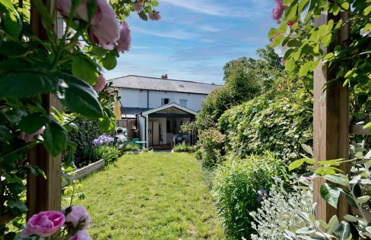 The view of the cottage from the garden (Image: Seymours)