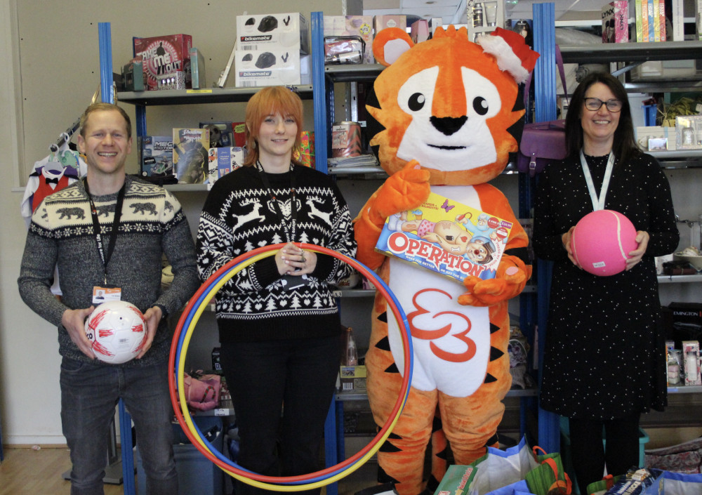 Cheshire Without Abuse, who have a charity shop on Jordangate, were one of the local charities to receive prezzies. (Image - Everybody Health and Leisure)