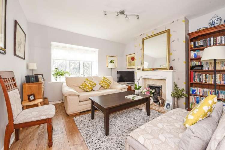 The living room with feature fireplace  (Image: Mervyn Smith)