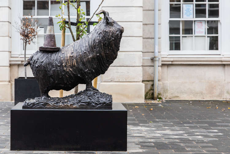 The playful bronze goat carries a traffic cone (Image: InKingston)