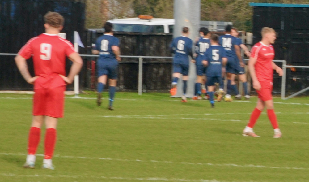 Josh Folkes congratulated after putting Hadleigh ahead (Picture: Nub News)