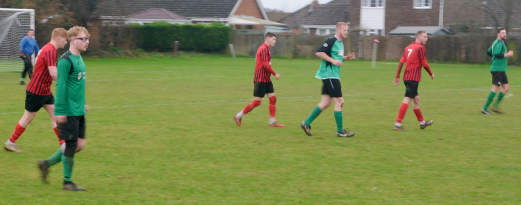 Shotley Rose centre half (middle) opened scoring against Holbrook Swan (Picture: Nub News)