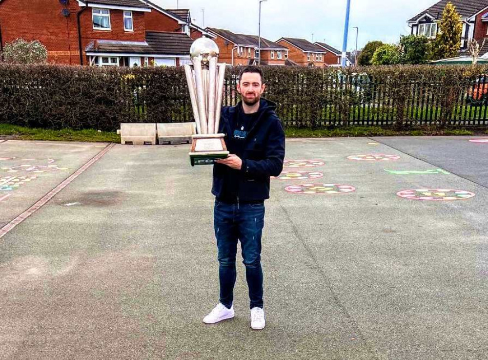 PDC world champion of darts, Luke Humphries, showed off his new trophy for the first time to Mablins Lane Primary School on Wednesday 10 January (X).