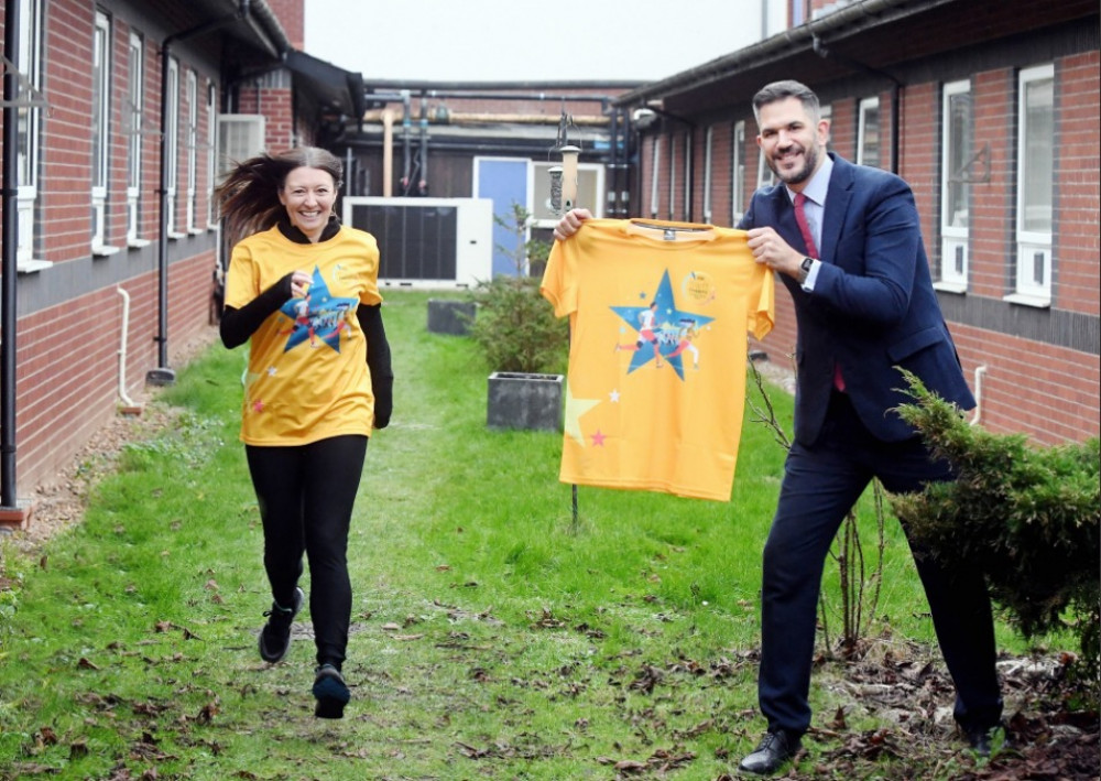 The Wigley Group's Laura Liggins - who is running for SWFT Charity - alongside South Warwickshire University NHS Foundation Trust MD Adam Carson at the site of the planned sensory garden at Warwick Hospital (image via Advent PR)