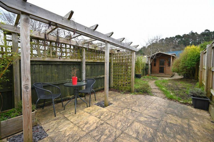 A summer house and a patio in this south facing garden, image Rightmove