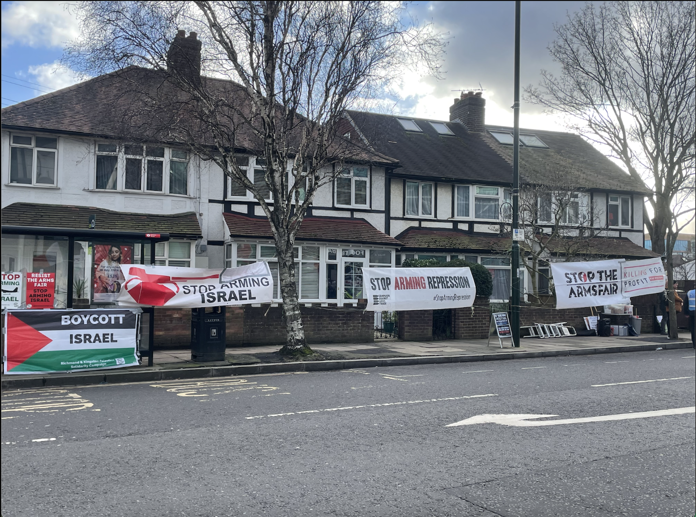 Signs could also be seen across the road from the stadium. (Photo Credit: Heather Nicholls).