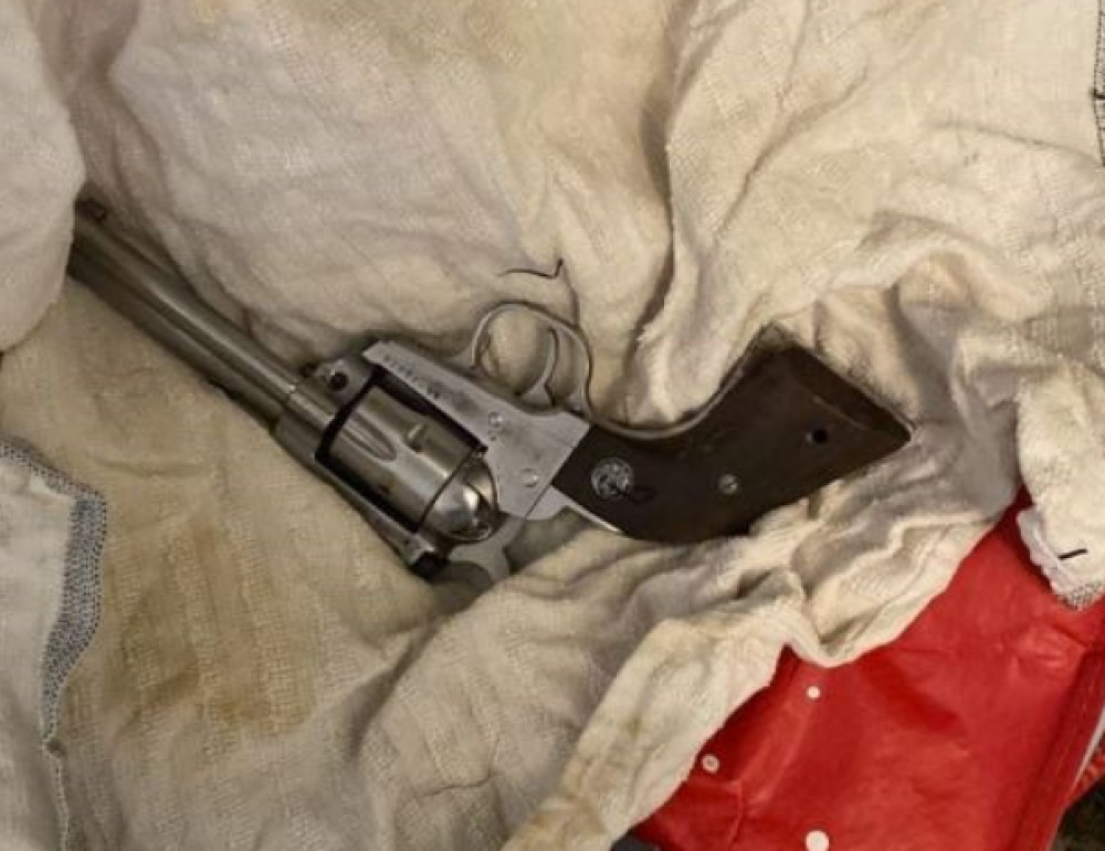 Three men were forensically linked to a loaded revolver-style handgun and ammunition at an address in Edgeley (Image - GMP)
