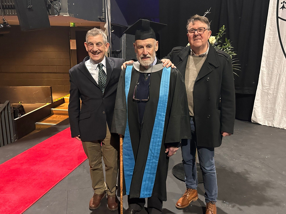 Dr David Marjot at his Kingston University graduation with his son and son in law. (Photo: Supplied)