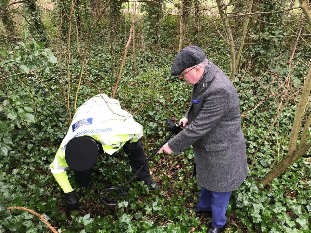 PCC Rupert Matthews in a Leicestershire park searching for knives with a metal detector. Image credit: PCC Rupert Matthews.