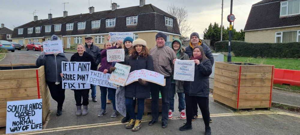 Locals protest, calling for the planters on Southlands to be removed (Image: Marie John)