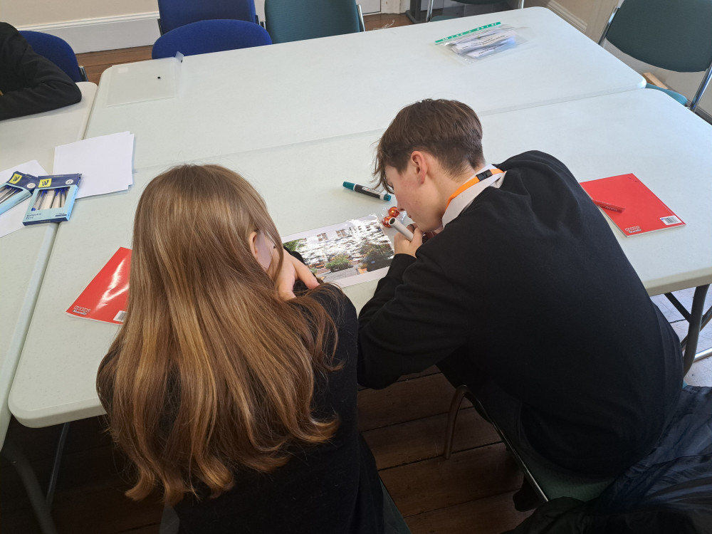 Two pupils at work on the project (Credit: Clarks Village) 