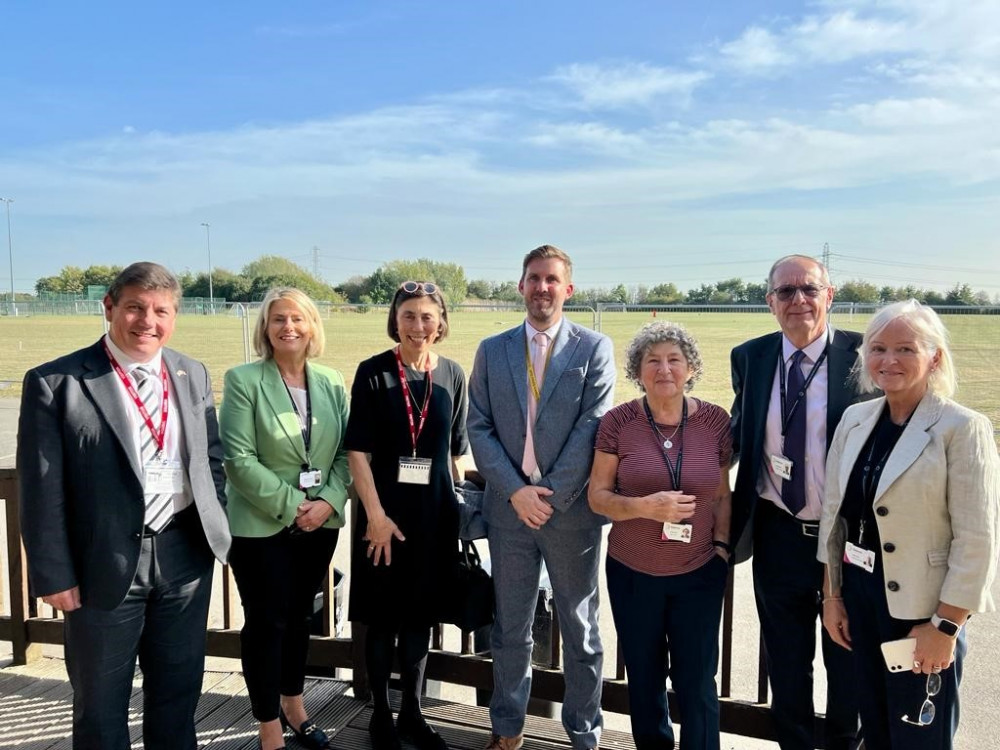 Stephen Metcalfe (left) with Parliamentary Under Secretary of State at the Department for Education Baroness Barran (third from left) discussing future provision with members of the team at Stanford-le-Hope's St Clere's School. 