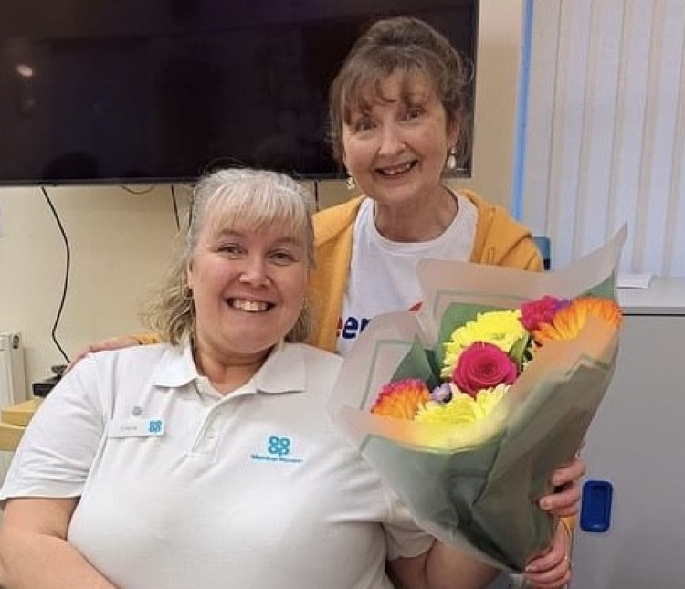 The Co-op's Claire Mason was presented with flowers. 