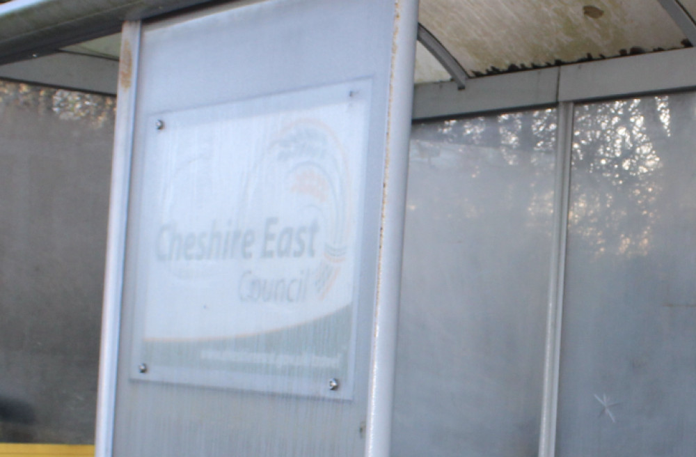 A Cheshire East Council sign at a bus stop. (Image - Macclesfield Nub News)