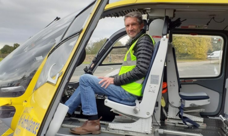 Jon sitting in a North West Air Ambulance helicopter. (Image - North West Air Ambulance) 