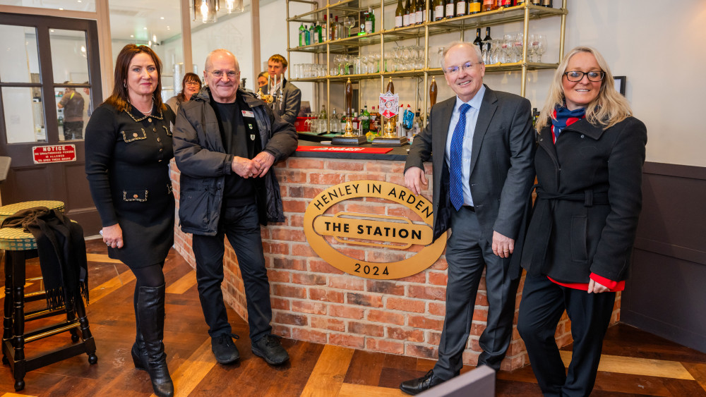 Network Rail colleagues with the Friends of Henley in Arden Station (image via Network Rail)