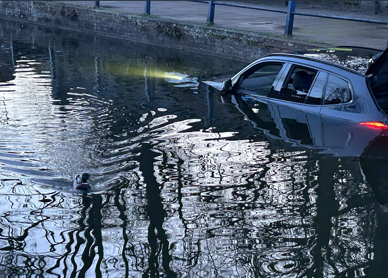 Making a splash: SUV ends up in the River Hiz after taking the wrong turn in the wrong gear. CREDIT: Supplied to Nub News 