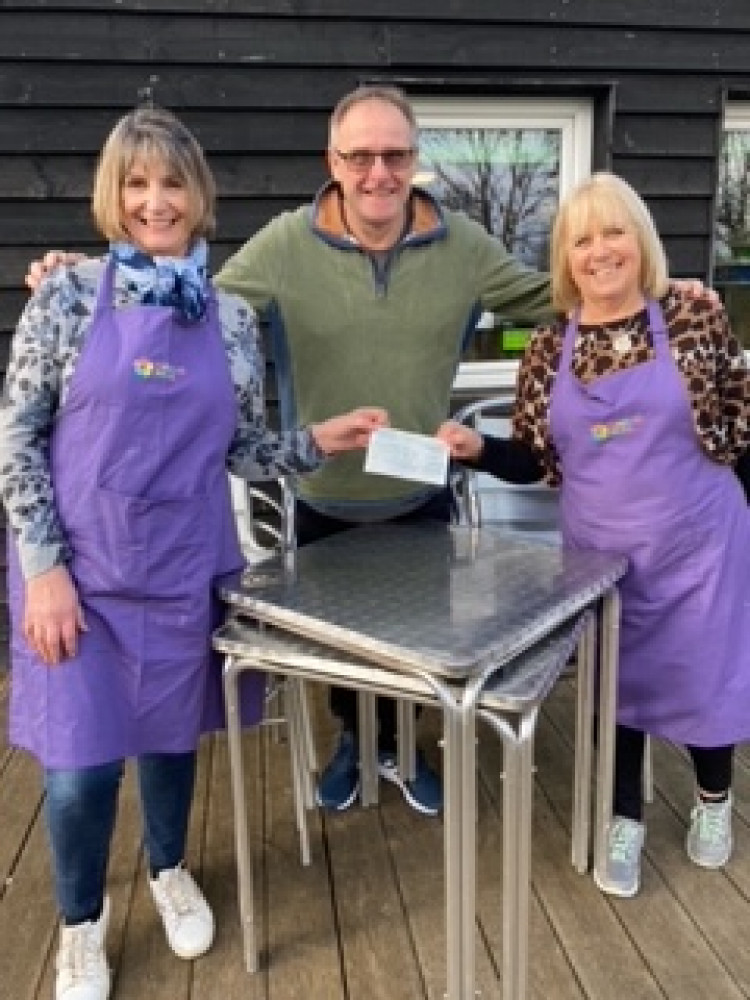 Steve Walker from Mardyke Valley Rotary Club presented the cheque to Jill and Sheila at Hardie Park 
