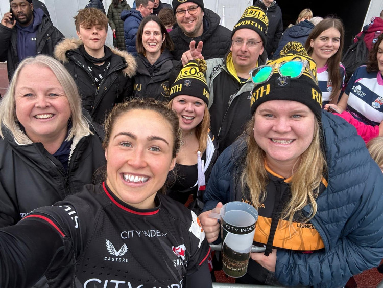 Some of the Lionesses with Saracen's and England player, Sydney Gregson, who began her rugby career at Letchworth RFC. CREDIT: Lionesses Academy, Letchworth Rugby Club 