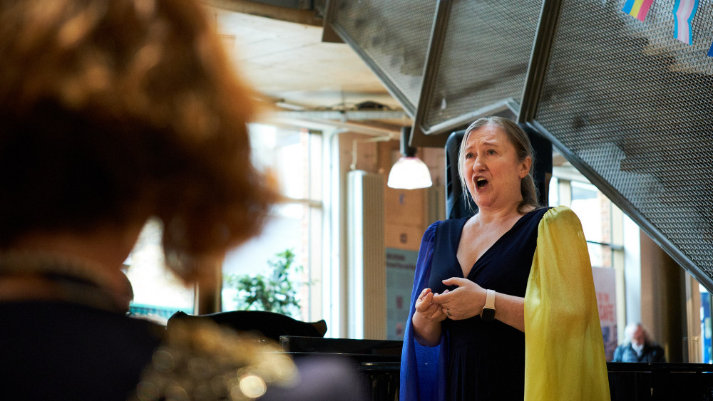 Soprano Tamara Ravenhill performing at the Rose Theatre Café in front of the mayor of Kingston, Councillor Diane White (Photo: Oliver Monk)