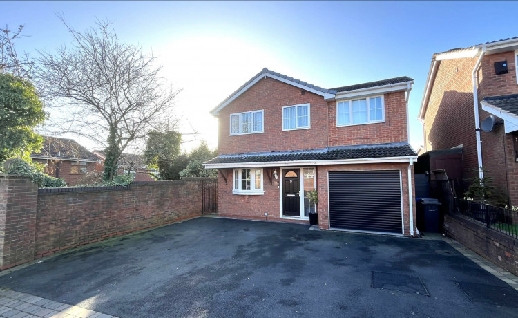 This beautiful detached family home, on Longclough Road, is up for sale for £229,950 (Stephenson Browne).