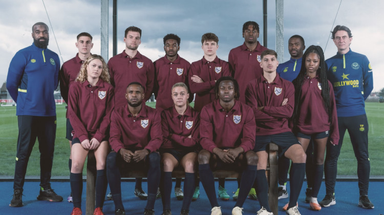 The crest of the claret shirt features the letters 'BFC' and a blue zig zag line to represent the River Thames (credit: Brentford FC). 