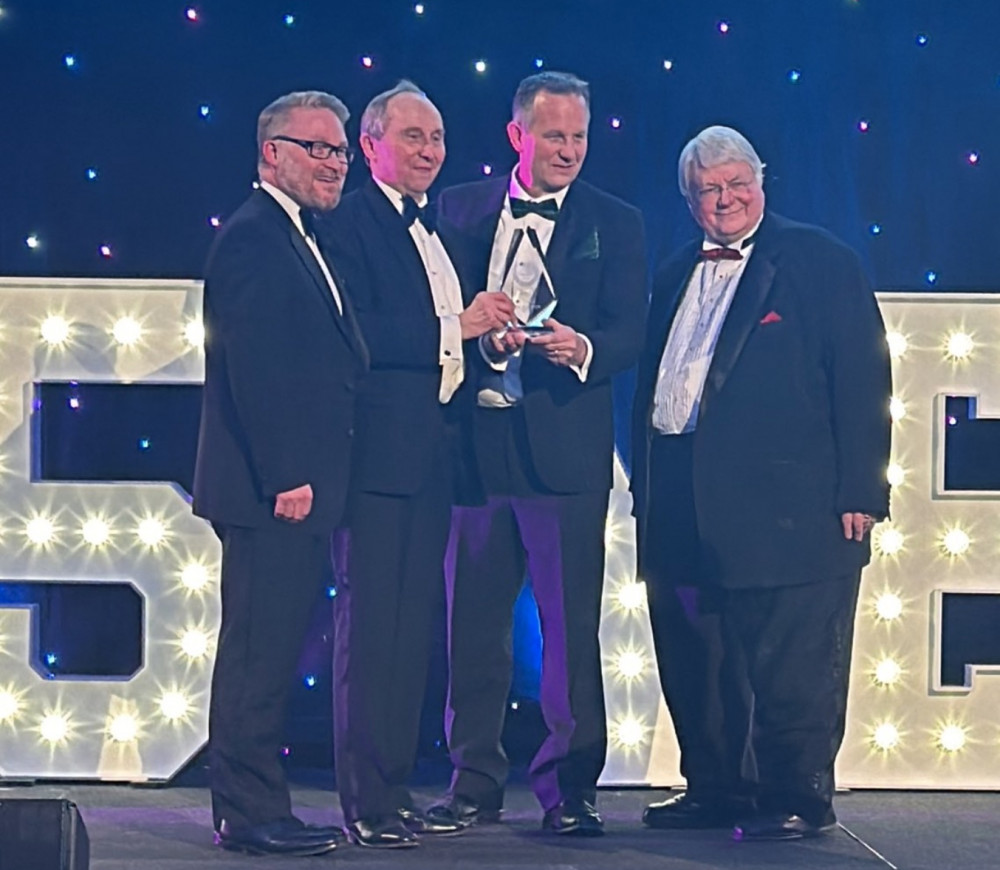 Babergh leader John Ward picking up Council of Year Award in London (Picture: iESE)