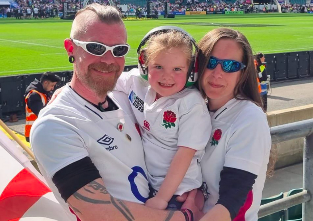 Steve and Lisa supporting England Rugby with one of their rugby-loving girls! Image credit: Lisa Abbott. 