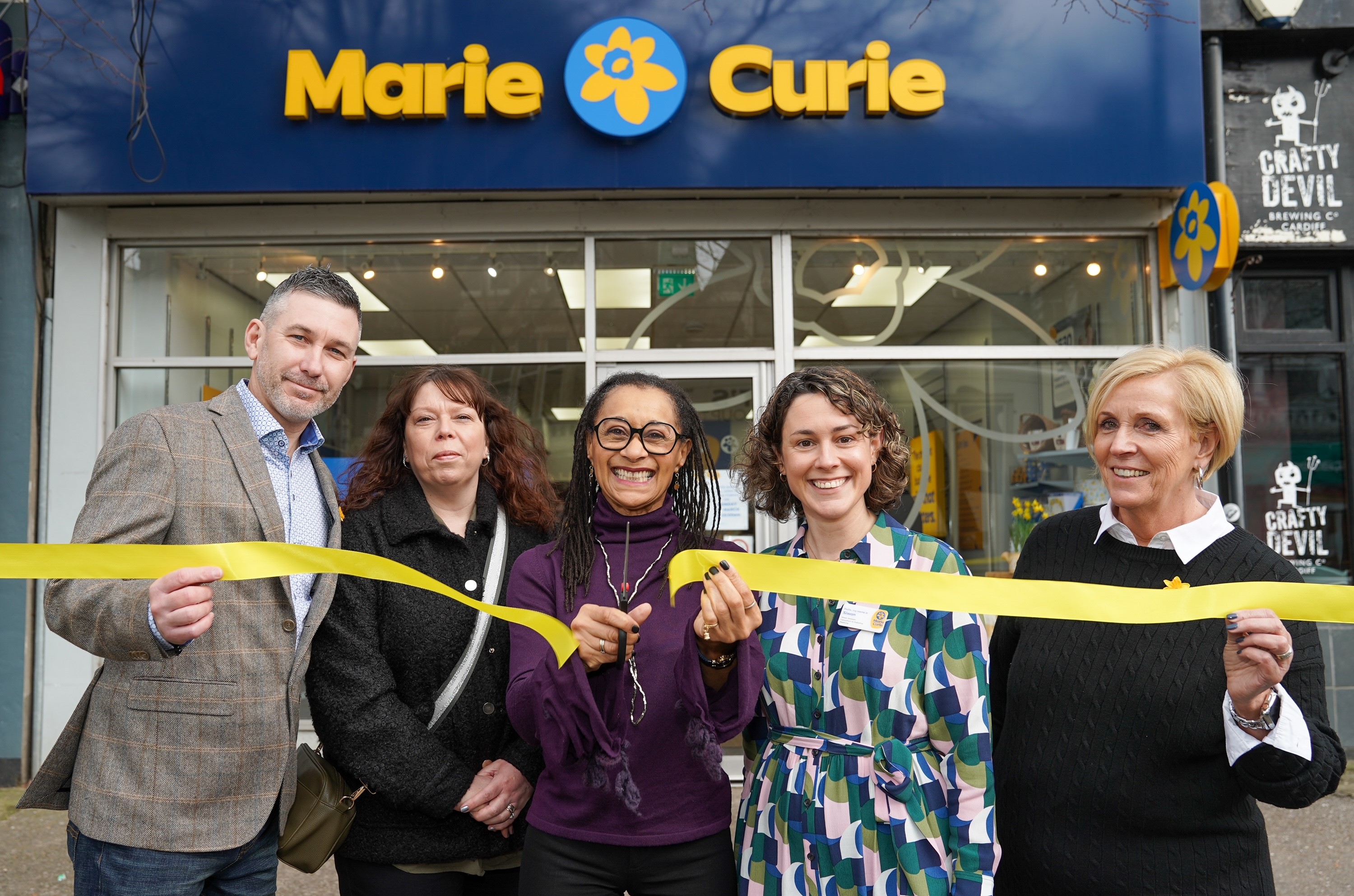 Neil and Amanda Andrews, Suzanne Packer, Siwan Seaman, Medical Director at the Marie Curie Hospice, Cardiff, and the Vale and Jacqui Woolley, Marie Curie Retail 