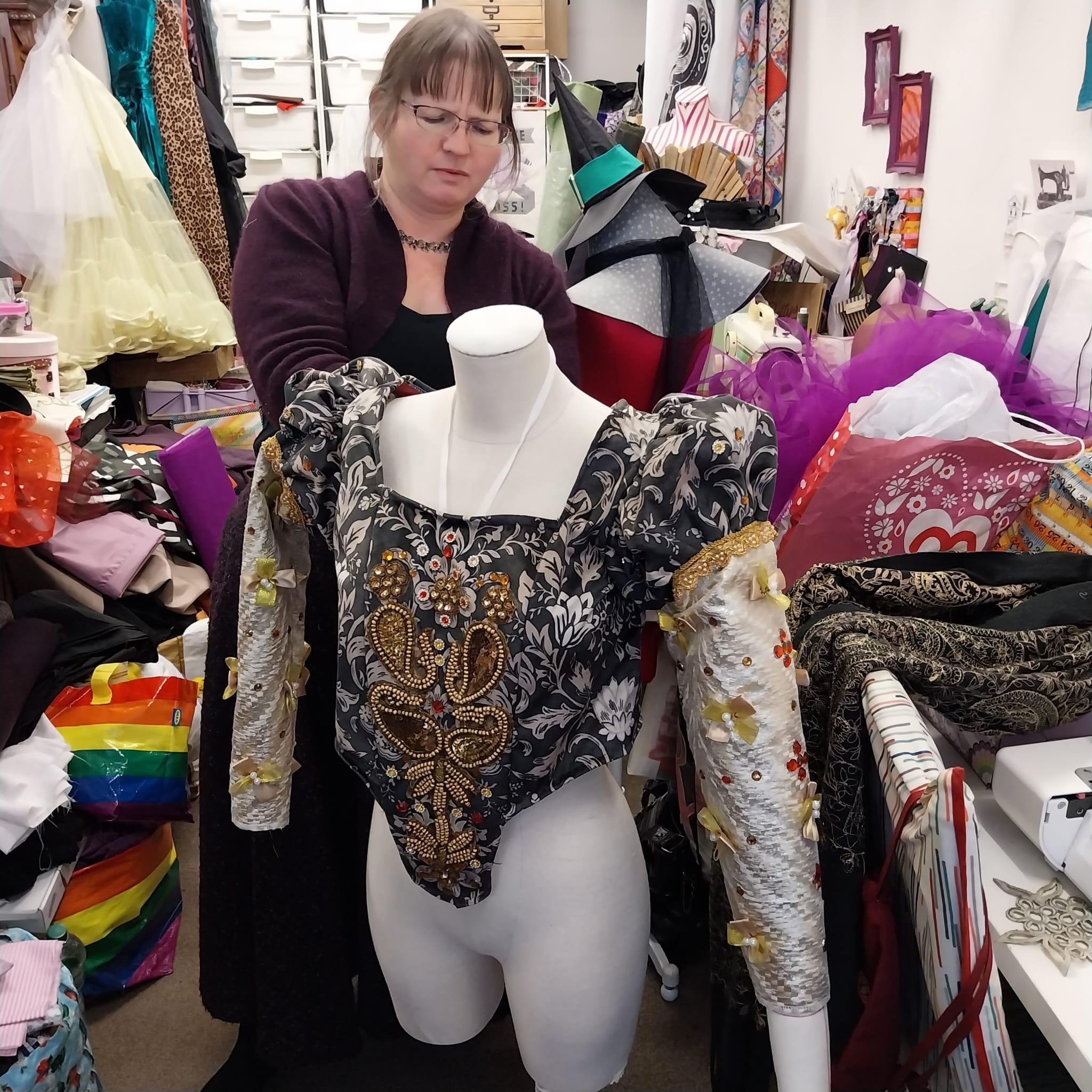 TV and film costume-maker Angharad Gamble working on the specially designed costume for PODS Chairman Mary Gardner who will play the role of Queen Elizabeth I