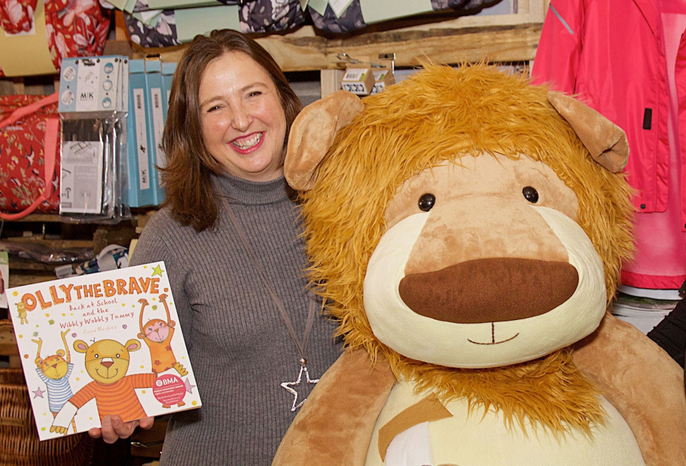 Rachel Ollerenshaw and the Olly the Brave mascot from Molly Ollys (image supplied)