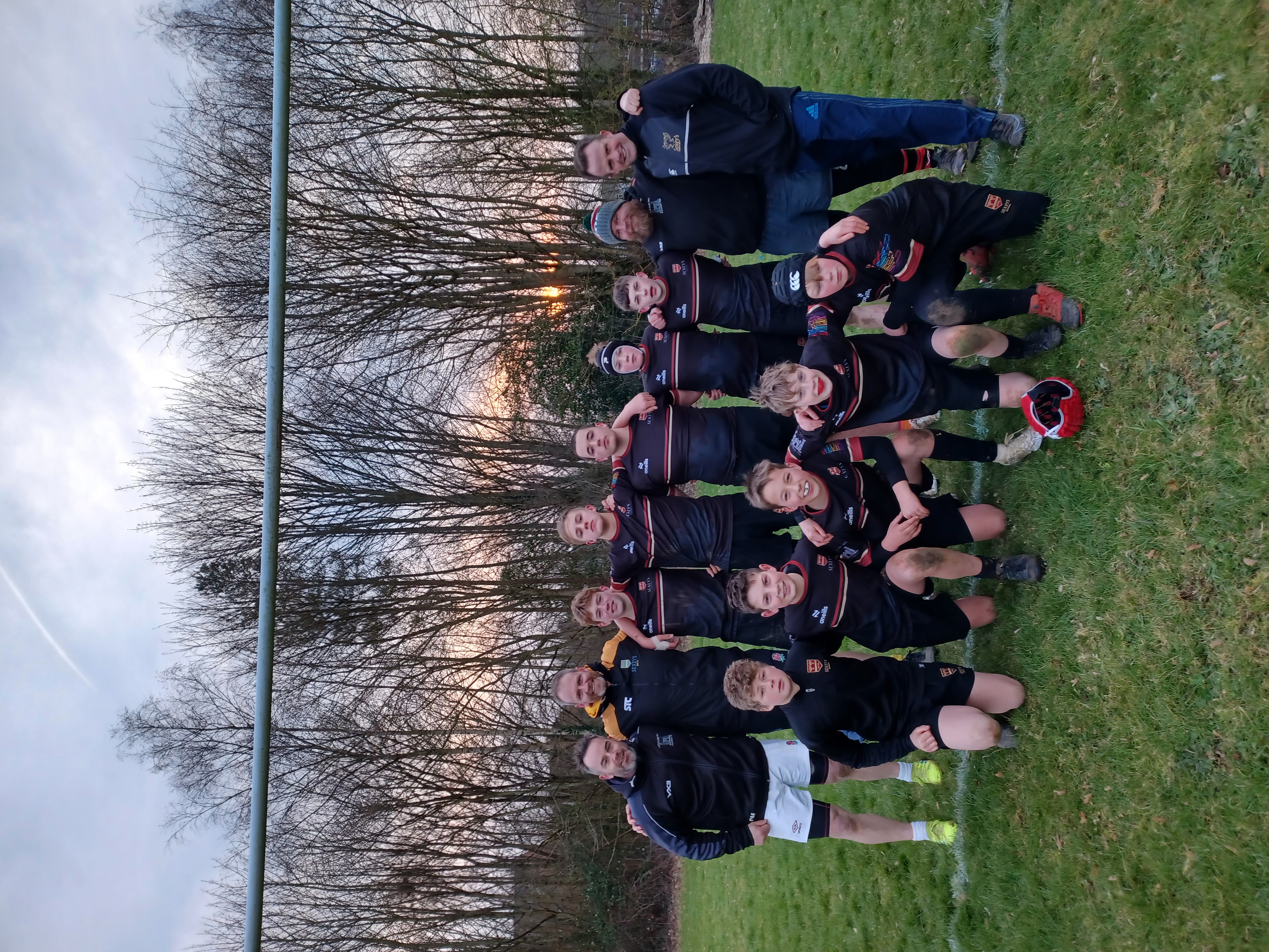 Year 8 Rugby Team group photo with coaches - Back row: Mr McLennan (Castle Cary RFC), Mr Moise (Sexey’s School), Jake F, Billy B, Arnie H, Jon D, Jenson C, Mr Barnett (Castle Cary RFC), Mr Glover (Sexey’s School), Front row: Sam S, Harry B, George K, Hunter M, George D