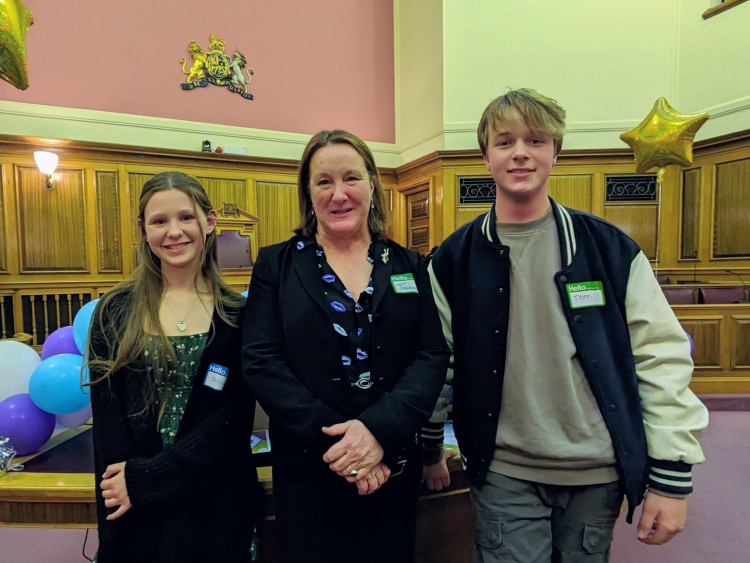 Theresa Leavy, Dorset Council's Executive Director for Children Services, stands with newly elected Members of Youth Parliament Tamzin Caves (DMYP) and Tom Clifton (MYP)