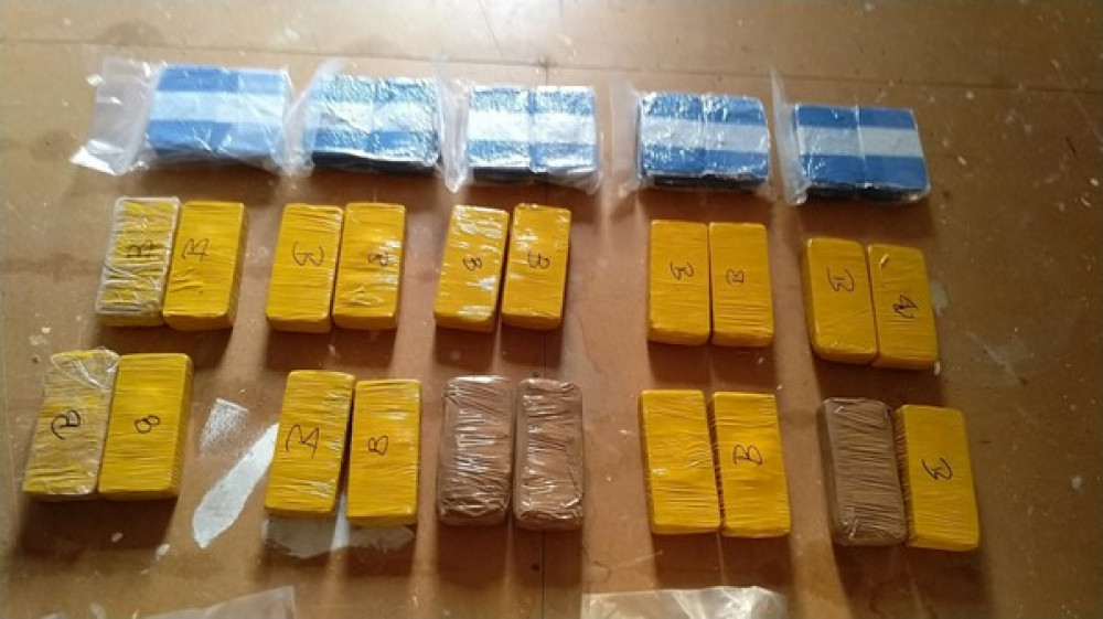 Kilo sized blocks of Class A drugs seized by police that led to Mohammed Waqas Khan, 35, being convicted. CREDIT: Eastern Region Special Operations Unit