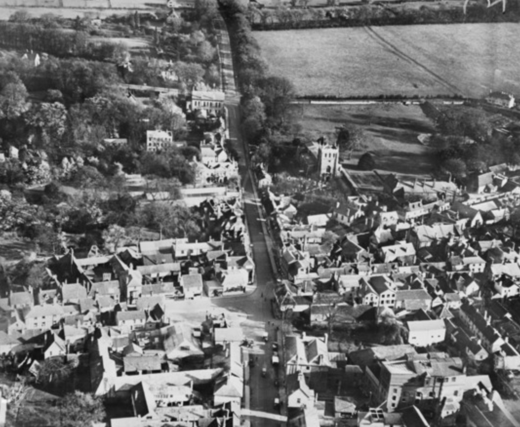 St John the Baptist's Church and Melbourn Street, Royston, 1928. CREDIT: Britain From Above 