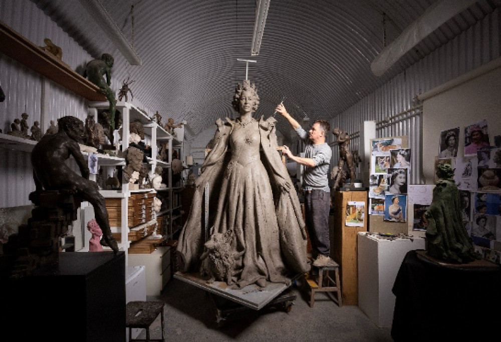 The sculptor Hywel Pratley at work on the statue of the late Queen in his London Studio. Winner of The British Press Photographers’ Association portrait award 2024, by Geoff Pugh, The Telegraph. Image credit: Geoff Pugh courtesy of Dr Sarah Furness.