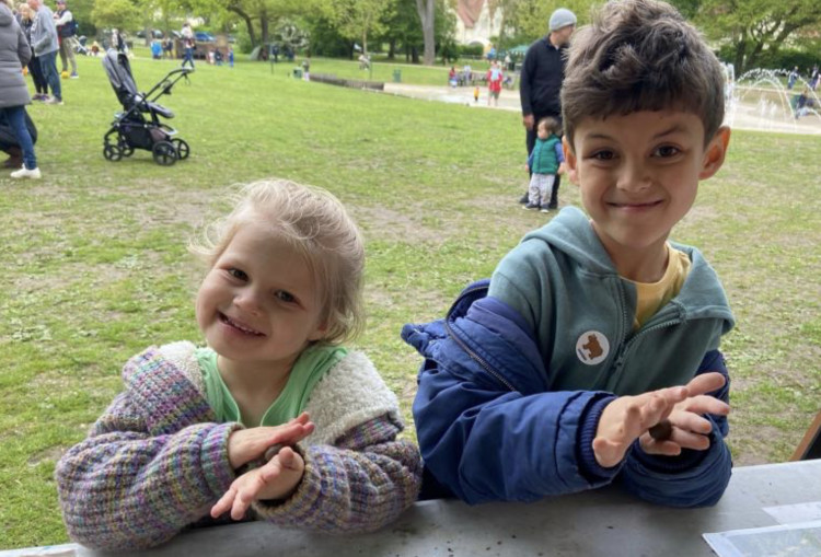 Keen young conservationists making 'seed bombs' at last year's event. CREDIT: NHC 