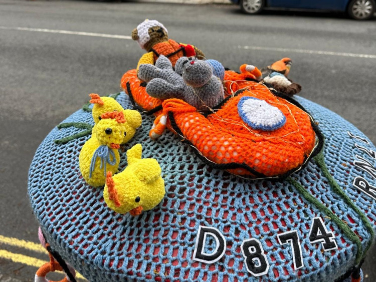 A new RNLI yarn bomb on the postbox between High Street and Kingston Lane in Teddington (Photo: Teddington RNLI)