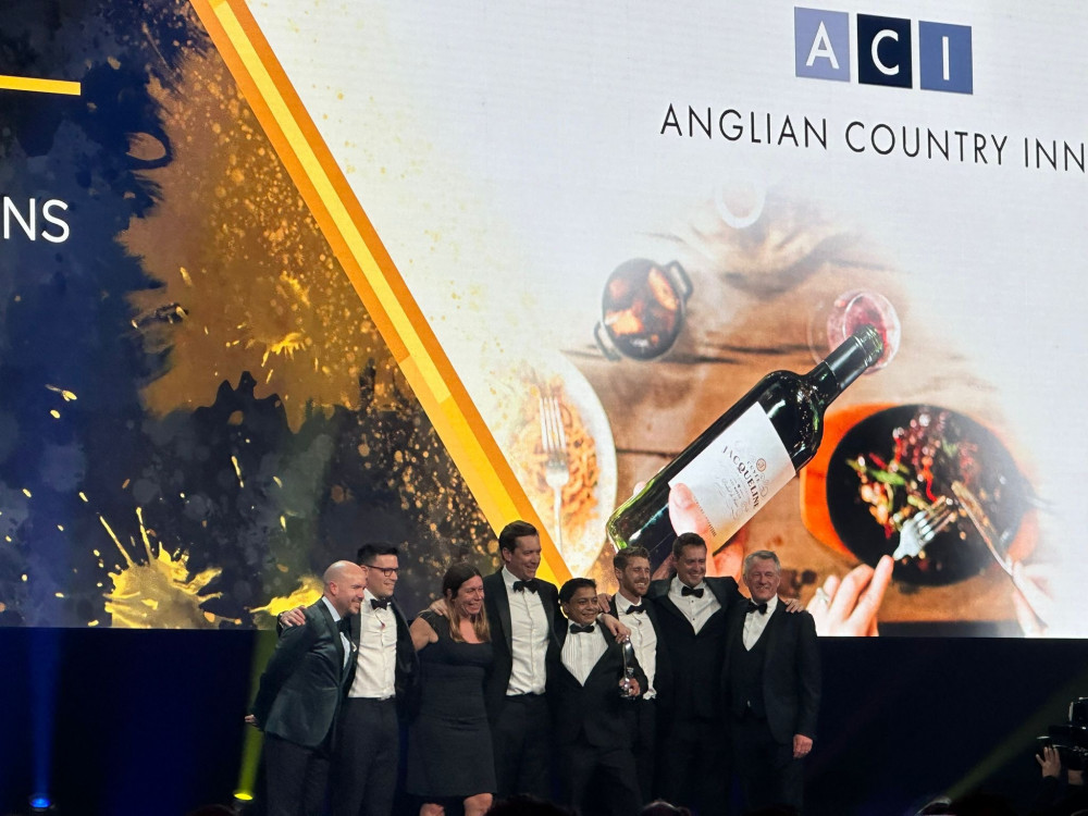 Winners! ACI celebrate their prestigious award handed over by comedian Tom Allen who hosted the ceremony. CREDIT: ACI 