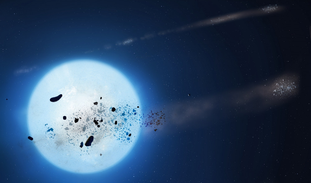 Clumps of debris from a disrupted planetesimal around the white dwarf (image via University of Warwick)