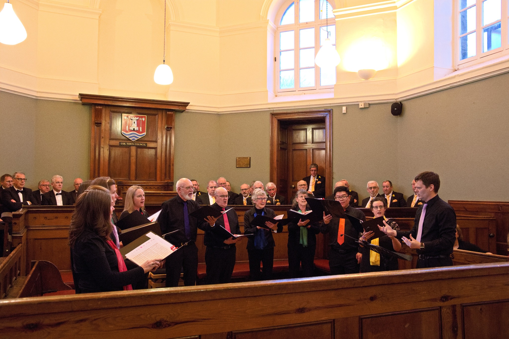 Spectrum Singers performing at Usk Choral Festival with RNLI fundraiser Shelagh Greenland, centre