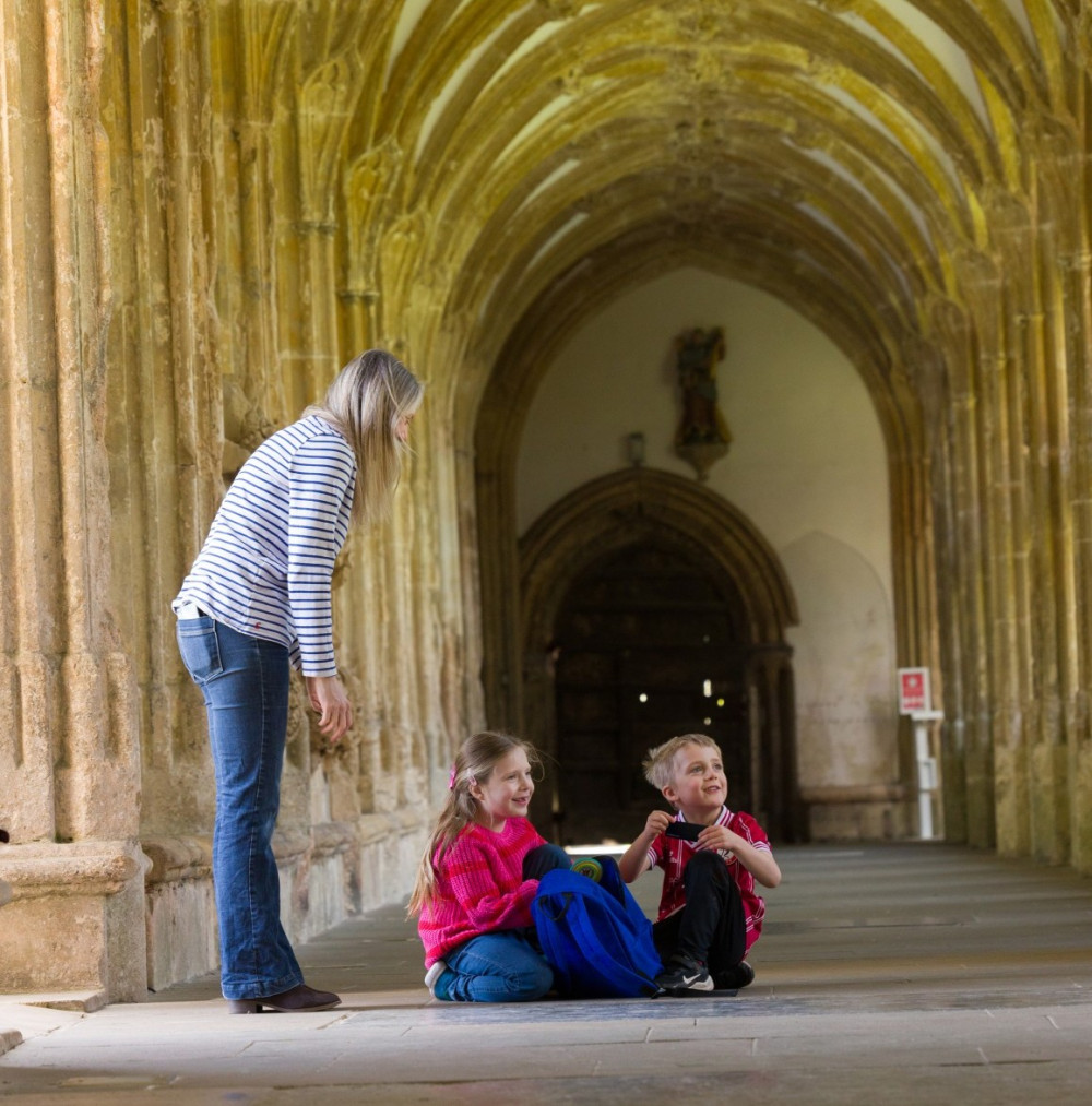  A family enjoying the new Explorer Backpacks at Wells Cathedral