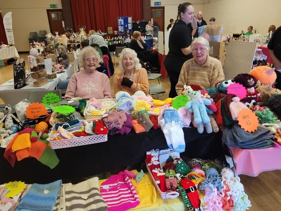 Group members knitted items to sell towards the fundraising. 