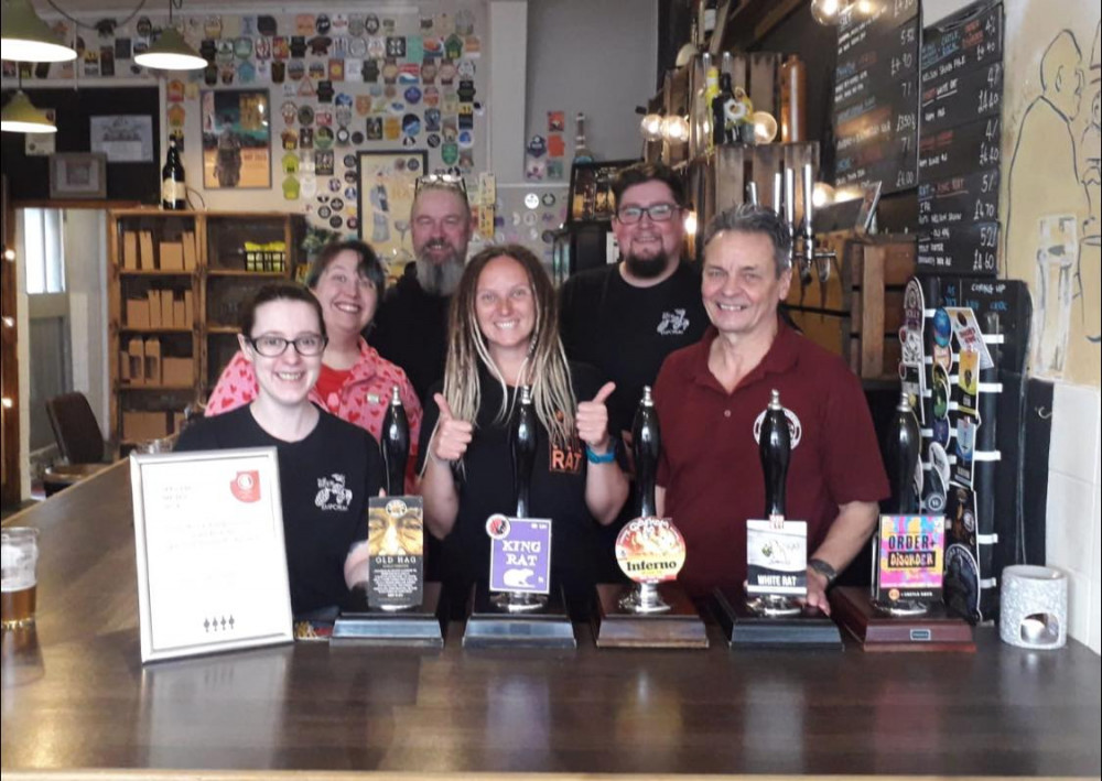 Chairman of South Cheshire CAMRA, Derek Davey (front right) presented the award to the Beer Emporium. (Photo: Beer Emporium)  