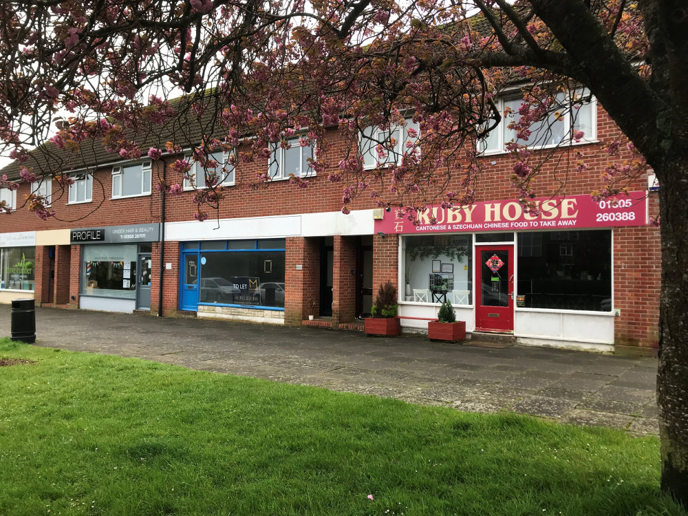 The vacant shop unit (centre) likely to become the Manor Park Convenience Store in Dorchester