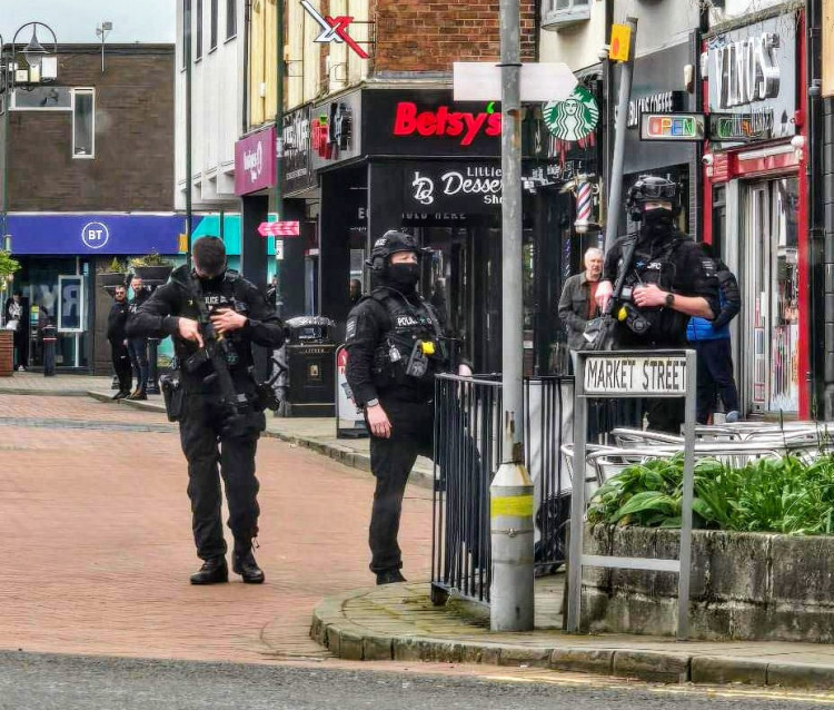 Armed police and a police helicopter were deployed to a major incident on Market Street, at 1:51pm on Thursday 18 April (Photo: Julie Vincent-Geoffrey).