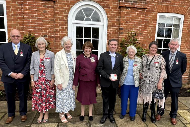 Mrs Mary Dicks, BEM, (second from left) with others who have been honoured. 